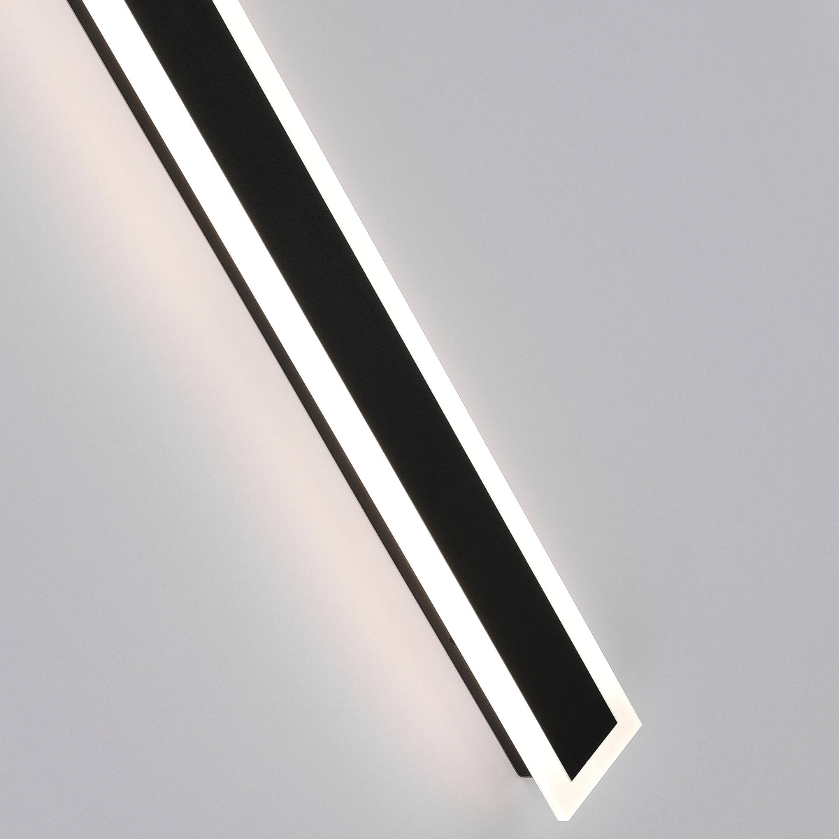 Linear outdoor wall light with a clear edge, close-up