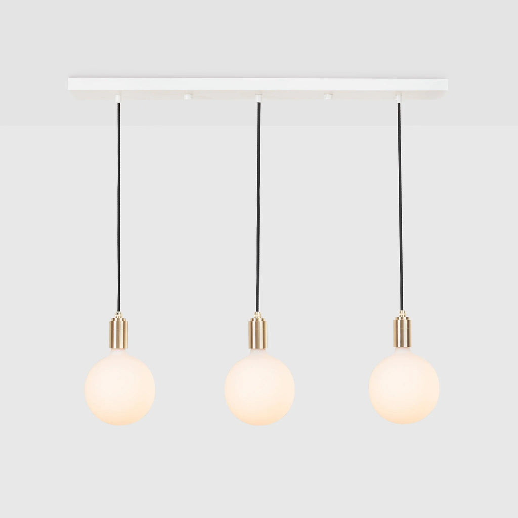 Linear triple opal globe pendant, on a white background