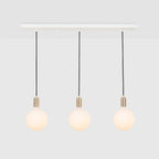Linear triple opal globe pendant, on a white background