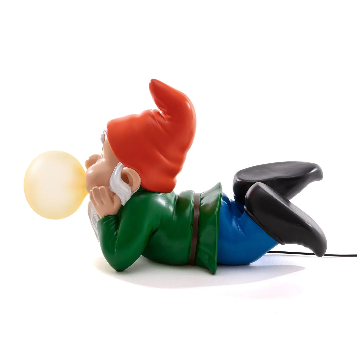 Lying dwarf table lamp with glowing glass bubble, unlit, seen from the other side