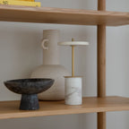 Cordless marble base table lamp, mini, white marble, on a shelf