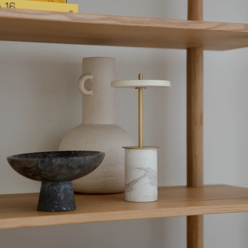 Cordless marble base table lamp, mini, white marble, on a shelf