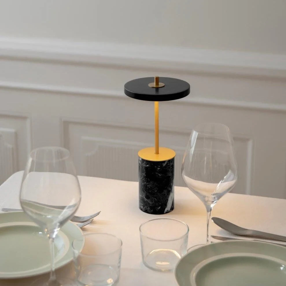 Cordless marble base table lamp, mini, black marble, on a dining table