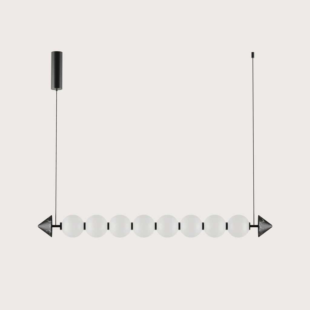 Marble bead linear LED pendant, on a plain background
