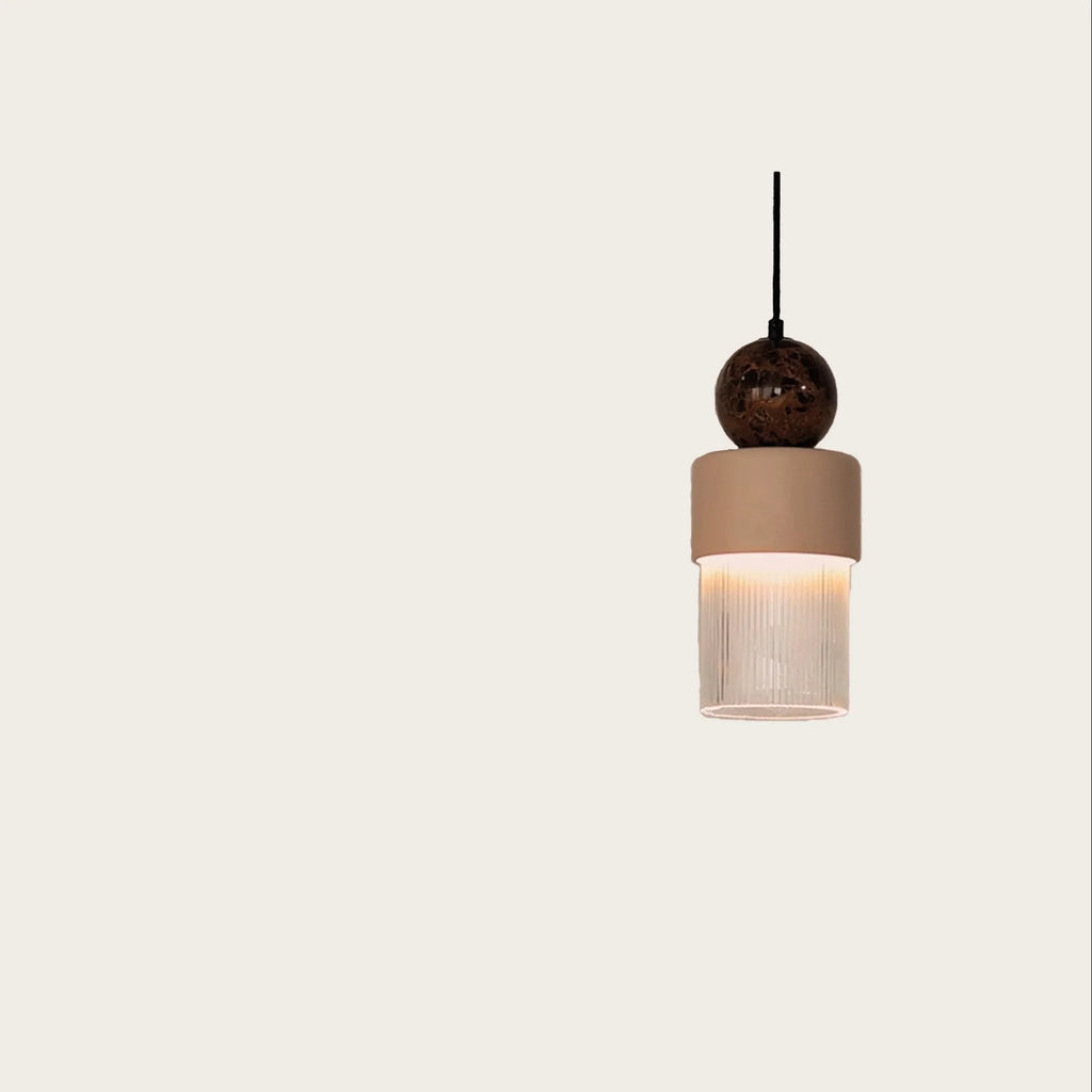 Marble, ceramic and striped glass pendant, lit, close-up