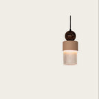 Marble, ceramic and striped glass pendant, lit, close-up