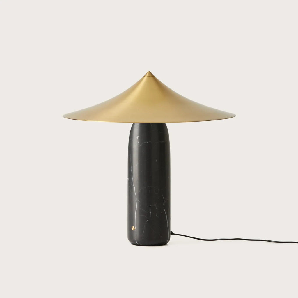 Marble table lamp with a wide pointed shade, black marble with a matt brass shade