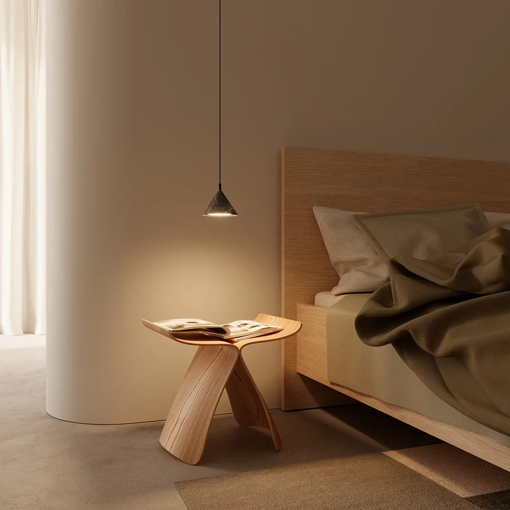 Marble cone LED pendant, hung beside a bed