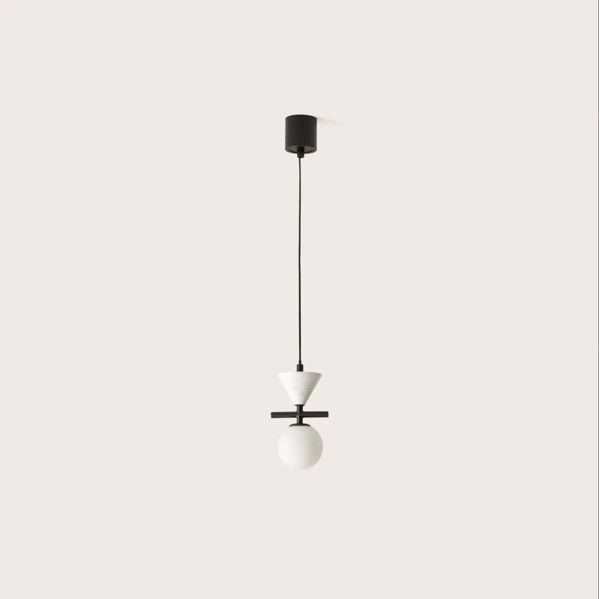 Marble cone and opal globe pendant, on a plain background