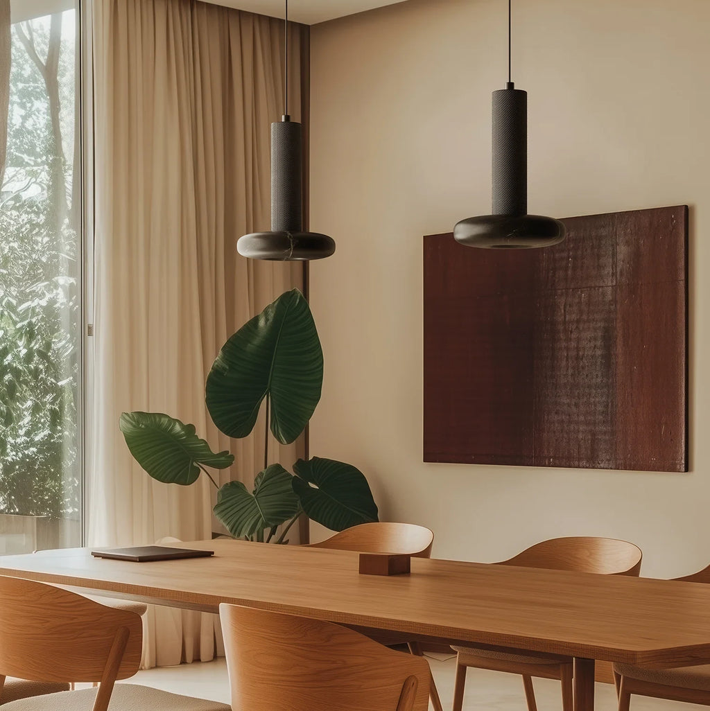 Marble disc cylinder pendant, above a dining table