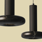 Marble disc cylinder pendant, close-up with black marble