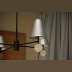 Marble disc four-arm LED chandelier, close-up of a shade and disc
