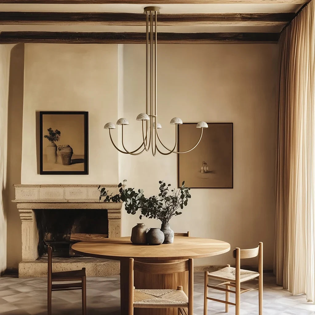 Marble dome six-arm LED chandelier, above a round table in a dining room