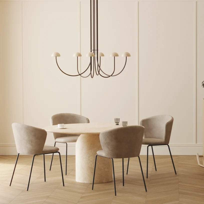 Marble dome six-arm LED chandelier, above a dining table with upholstered chairs