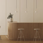 Marble dome pendant, row of three above a kitchen counter