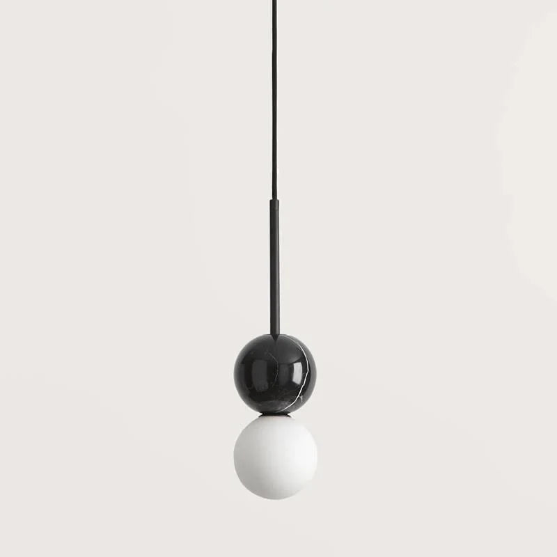 Marble and opal glass globe pendant, with green marble and matte black stem