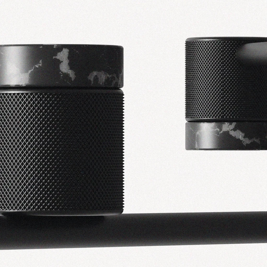 Black marble spot LED chandelier, close-up of the knurled heads with black marble