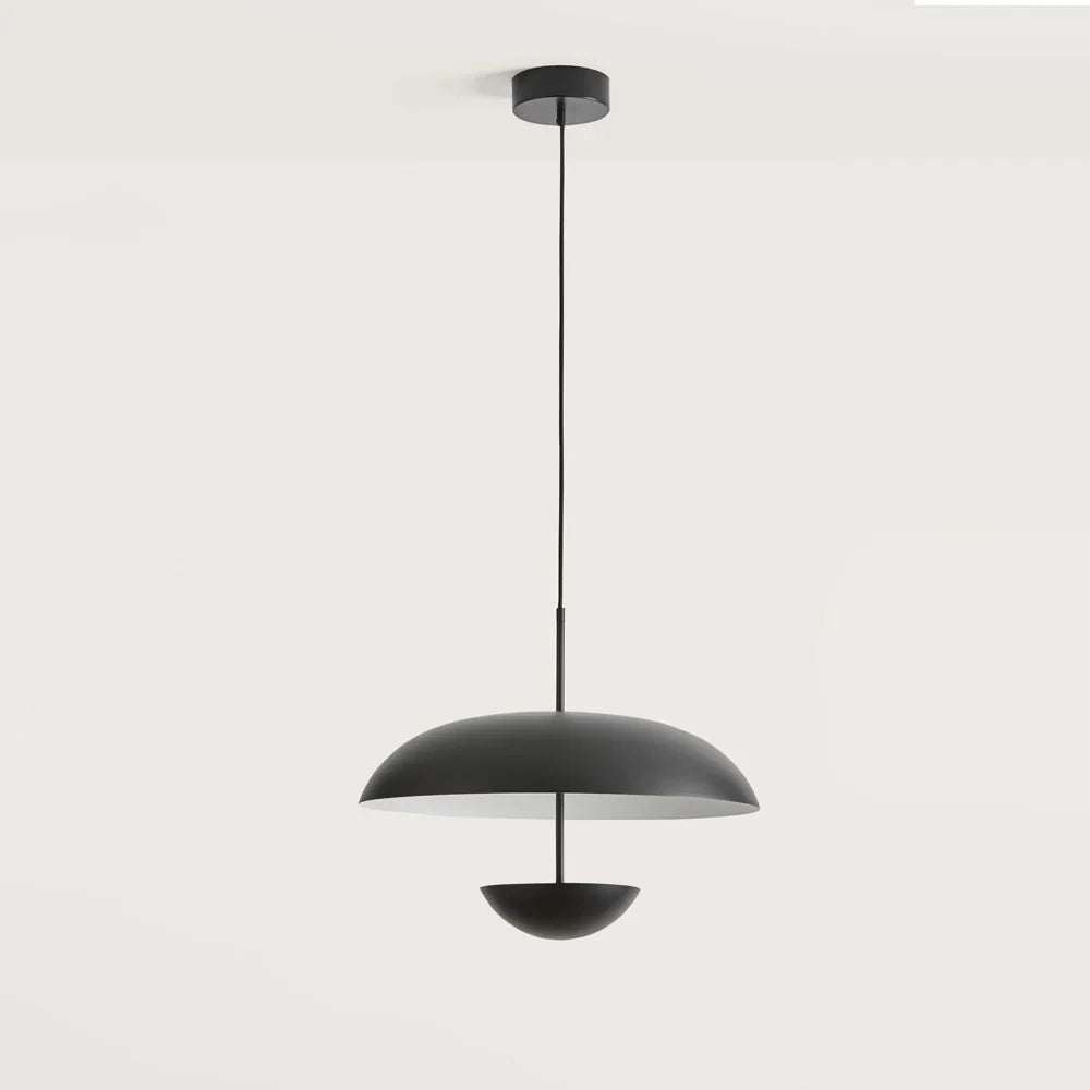 Matt black dome pendant with hanging diffuser disc, on a plain background