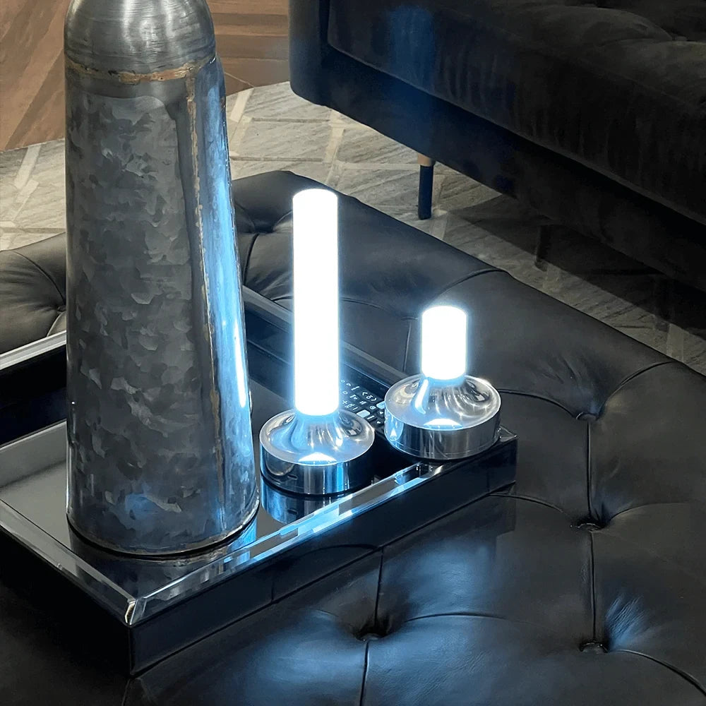Frosted column cordless table lamp, small and large lit on a tray