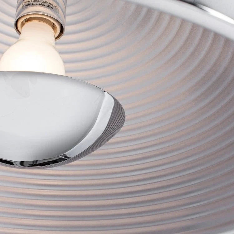 Metal dome pendant, close-up of the ringed reflector