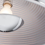 Metal dome pendant, close-up of the ringed reflector