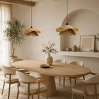 Wavy natural fibre pendant light, above a dining table