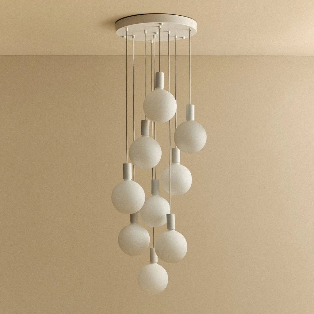 Nine-drop cluster pendant with opal globe bulbs, chalk, unlit