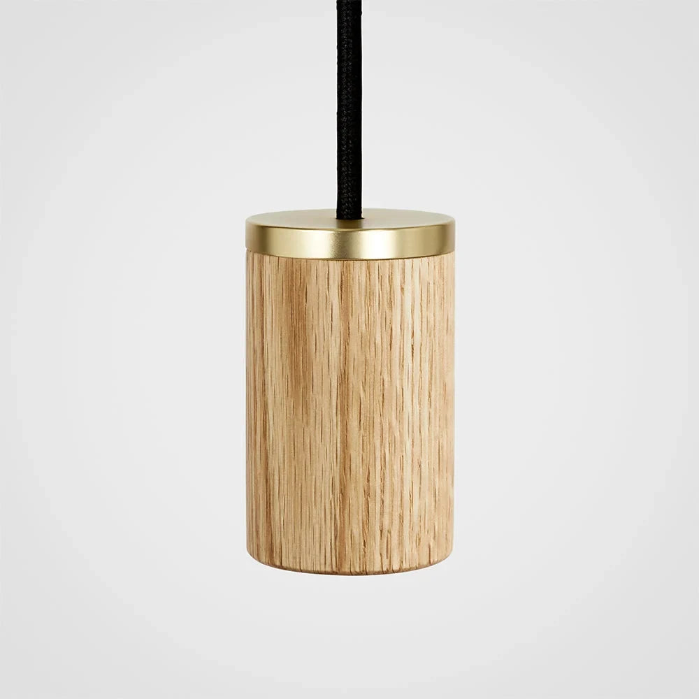 Nine-drop cluster pendant, oak, close-up of an oak and brass holder