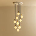 Nine-Drop Cluster Pendant, opal globe bulbs, oak, lit, nine opal globes at staggered heights