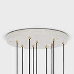 Nine-Drop Cluster Pendant, opal globe bulbs, oak, underside of the canopy showing nine cables