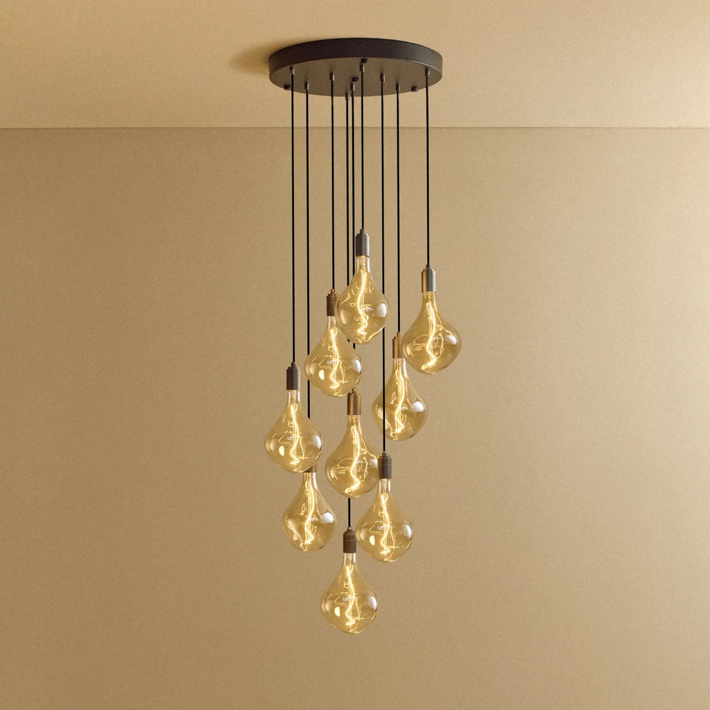 Nine-Drop Cluster Pendant, tinted sculptural bulbs, graphite, lit, nine bulbs at staggered heights