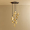 Nine-Drop Cluster Pendant, tinted sculptural bulbs, graphite, lit, nine bulbs at staggered heights