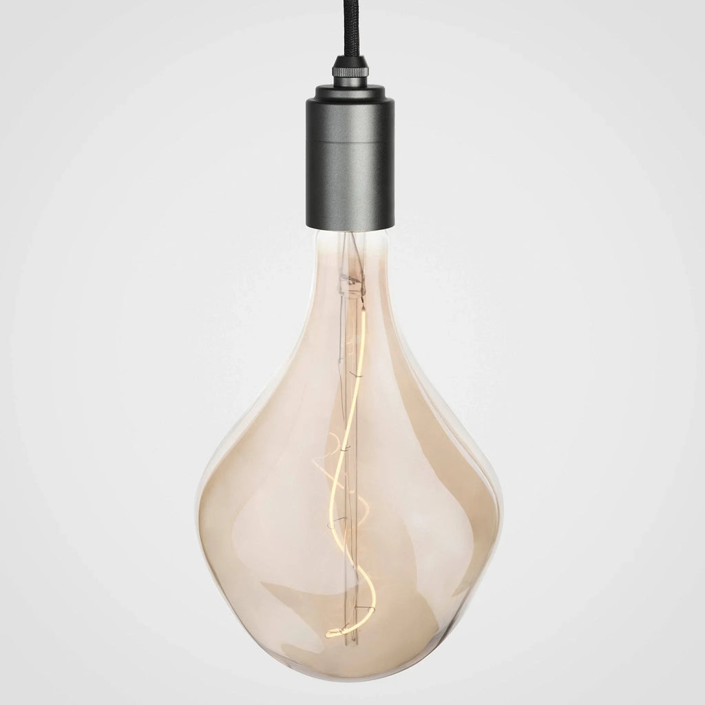 Nine-Drop Cluster Pendant, tinted sculptural bulbs, graphite, one lit tinted bulb on a graphite holder