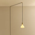 Opal cone bulb plug-in pendant, routed across the ceiling and down the wall