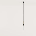 Opal glass tube pendant with marble ball, in aged gold with black marble