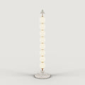Eight-sphere opal glass floor lamp with a marble base, on a plain background