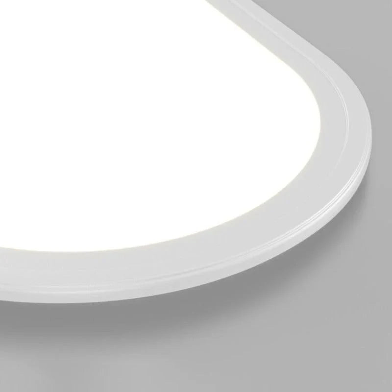 Slim oval LED ceiling light, close-up of the edge
