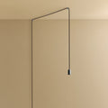Plug-in bulb holder pendant, routed across the ceiling and down the wall