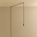 Plug-in pendant cable set with dimmer, graphite, hung from a wall node, shown without a bulb
