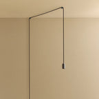 Plug-in pendant cable set with dimmer, graphite, hung from a wall node, shown without a bulb
