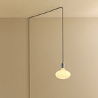 Plug-in pendant with large opal oval bulb, stainless steel, cable routed across wall and ceiling