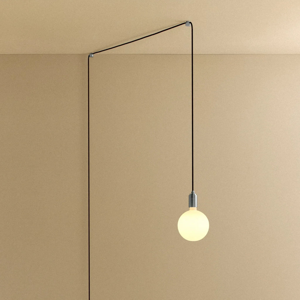 Plug-in pendant with opal globe bulb, stainless steel, cable routed across wall and ceiling
