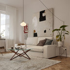 Plug-in pendant with opal oval bulb, brass, in a living room