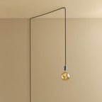 Plug-in pendant with small tinted sculptural bulb, stainless steel, cable routed across wall and ceiling
