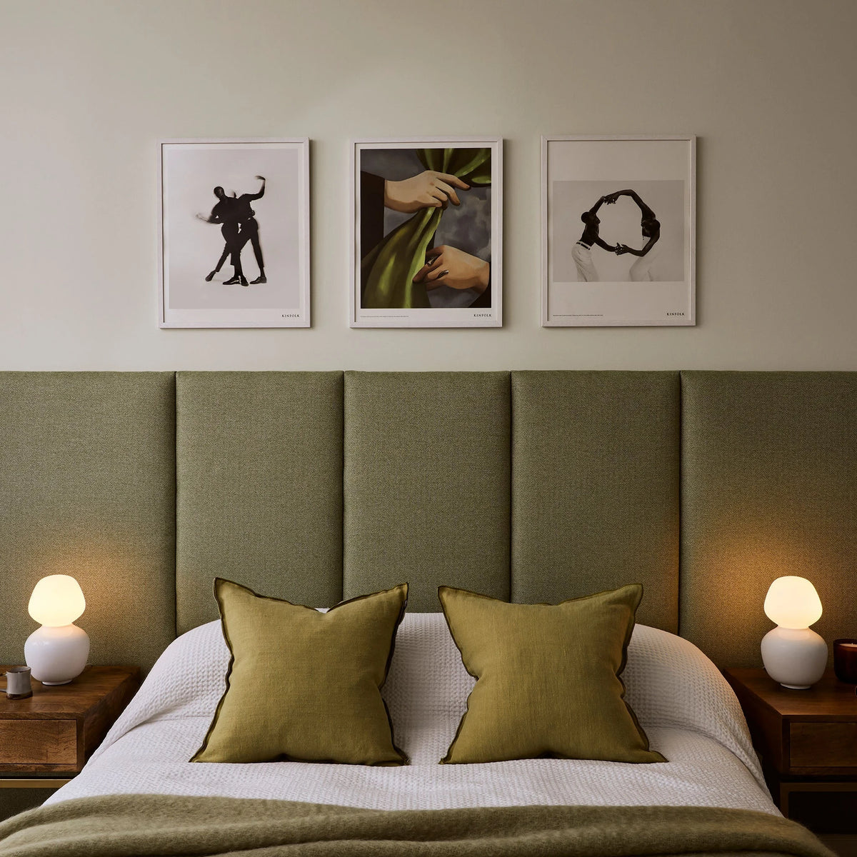 White porcelain table lamp with an angular opal bulb, pair on bedside tables either side of a bed