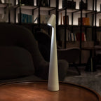 Slim cone cordless table lamp, lit in a living room