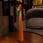 Slim cone cordless table lamp, lit in a living room