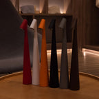 Slim cone cordless table lamp, six colours side by side