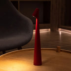 Slim cone cordless table lamp, lit in a living room