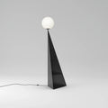 Pyramid base floor lamp with a white glass globe, in black
